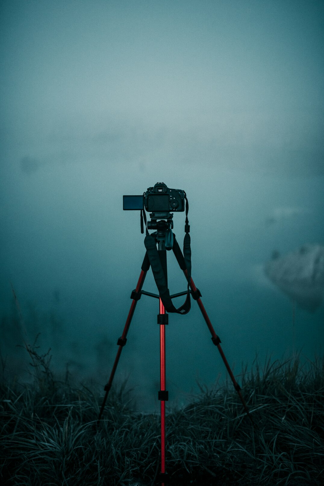 Professional broadcast camera mounted on a tripod inside a television studio